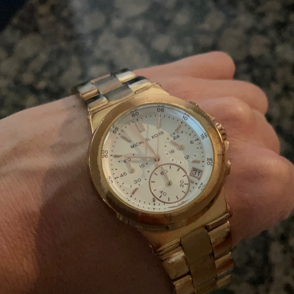 Michael Kors rose gold watch.